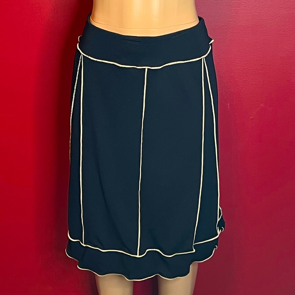 Brand new black with tan stripes a-line skirt. Size small
